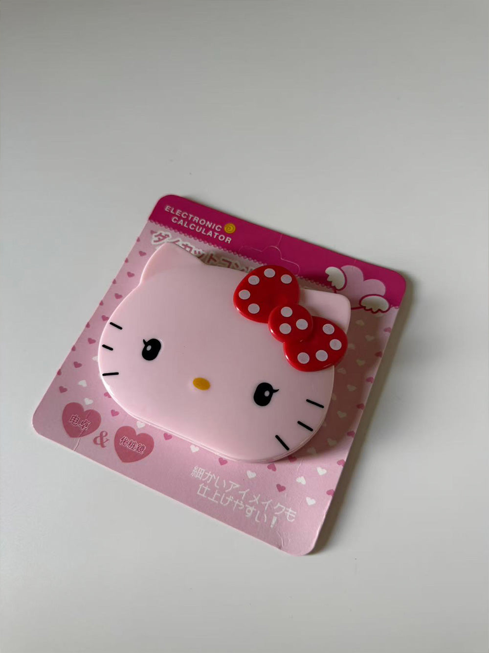 Sanrio Hello Kitty push-cover small flip calculator and mirror
